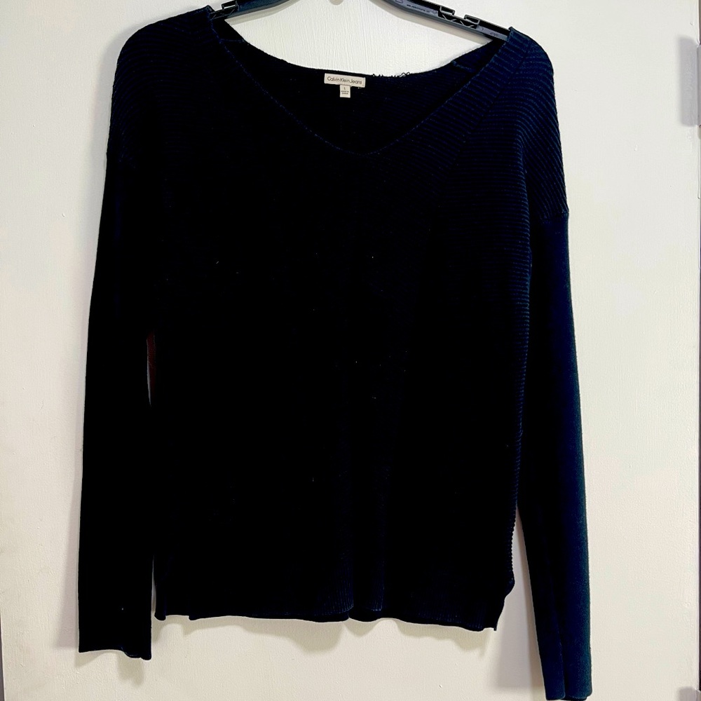 Black Calvin Klein sweater with a scoop/V-neck